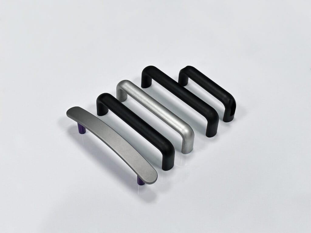 Heavy-duty stainless steel industrial door handle with anti-slip texture and reinforced mounting plate.