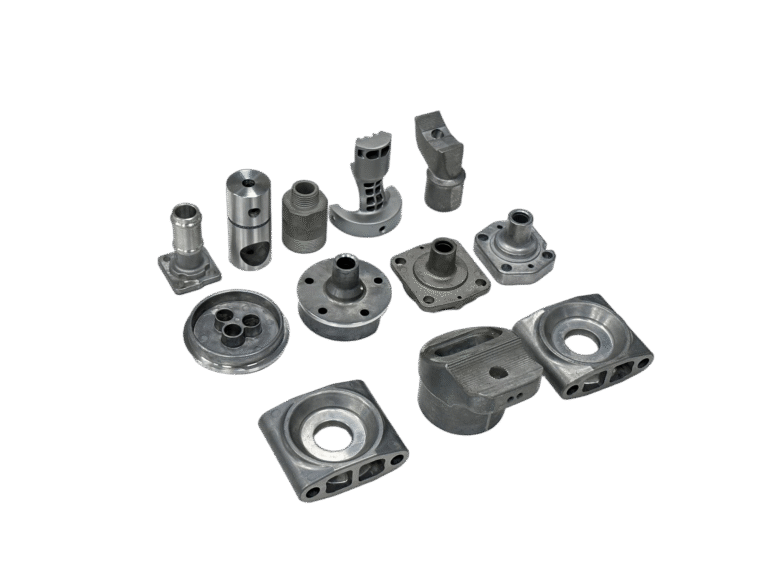 A variety of precision aluminum die casting products arranged on a white surface, showcasing flanges, housings, and custom mechanical components.