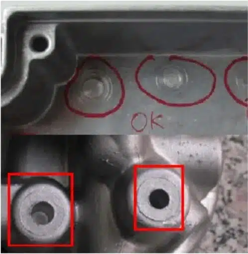 Aluminum HPDC defect—ejector pin marks (circular witness rings/indentations) highlighted on boss faces.