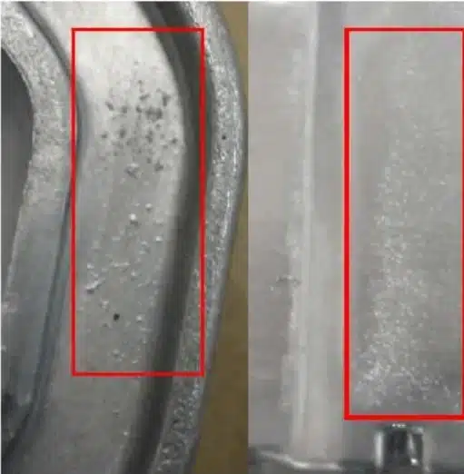 Aluminum die casting surface erosion (washout)—rough, pitted zones near gate from high-velocity impingement.