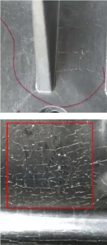 Aluminum die casting surface cracks (heat checking)—fine craze lines around rib/flat wall on an ADC12 part.