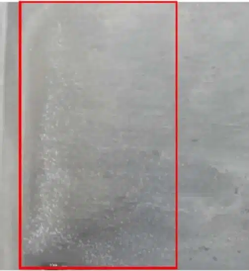 Aluminum die casting pitting/pinholes on flat surface (ADC12).