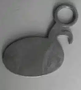 X-ray view of a die-cast part showing a visible flow line across the main body