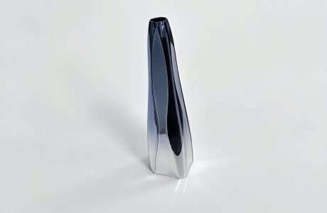 Zinc alloy die-cast beauty device housing with glossy electroplated finish.