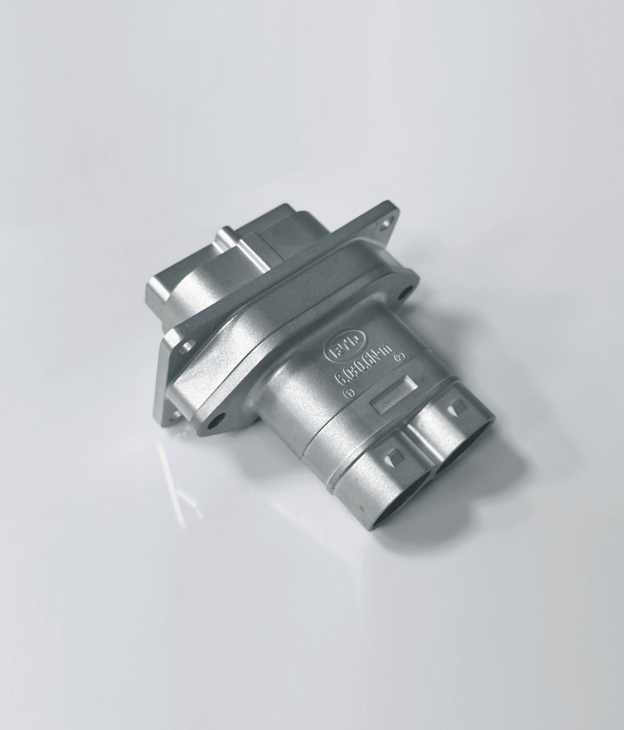 Automotive-grade aluminum die-cast EV charging port with reinforced cooling channels.